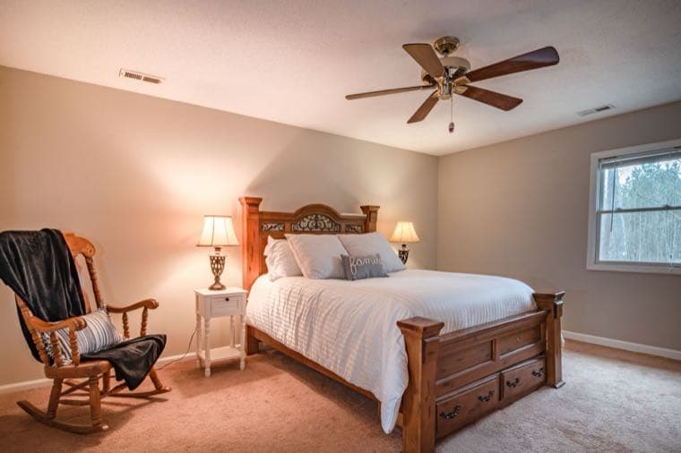 A cozy guest bedroom, representing renting on Airbnb and the tax implications in Australia