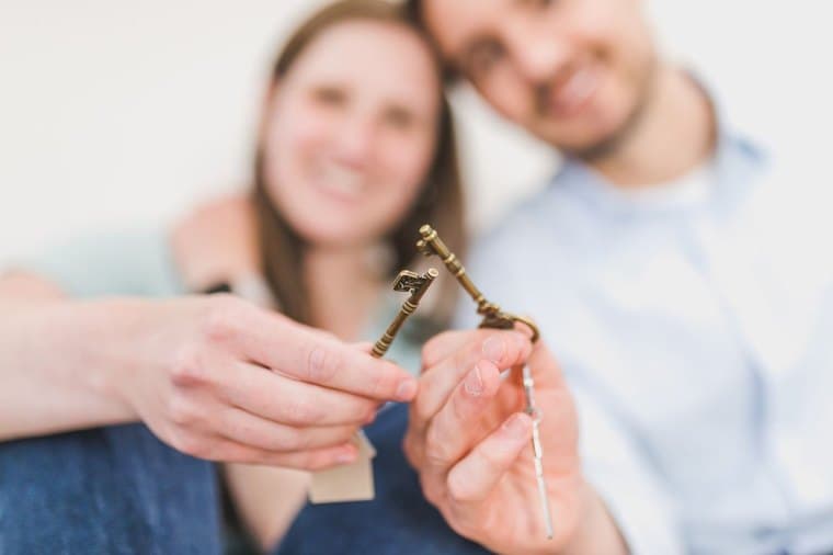 A couple celebrating the keys to their new home