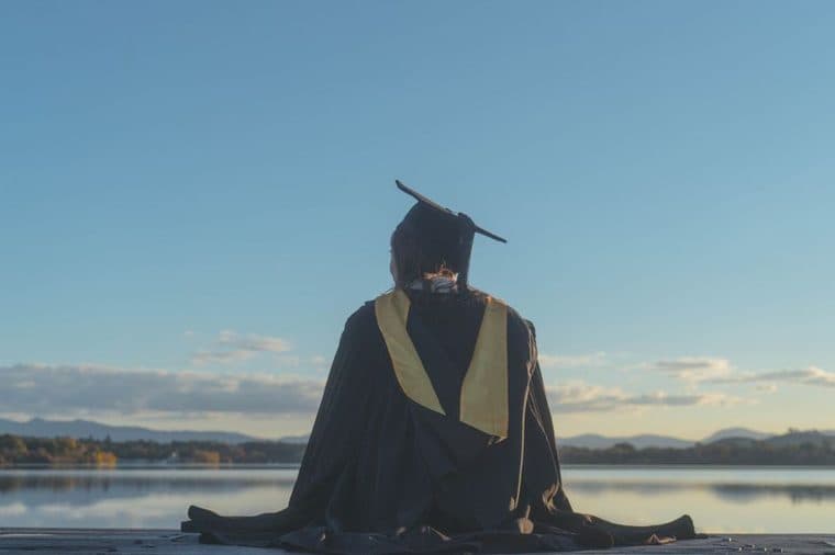 A university graduate at their graduation ceremony