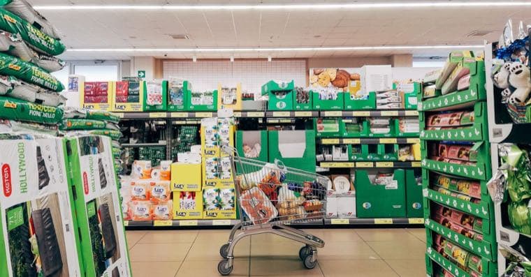 A trolley of fresh groceries in an Australian supermarket aisle