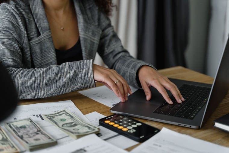A sole trader transferring money from a business account to a personal account