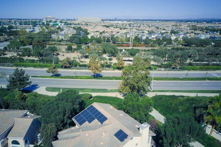 Rooftop solar panels on an Australian home under a blue sky