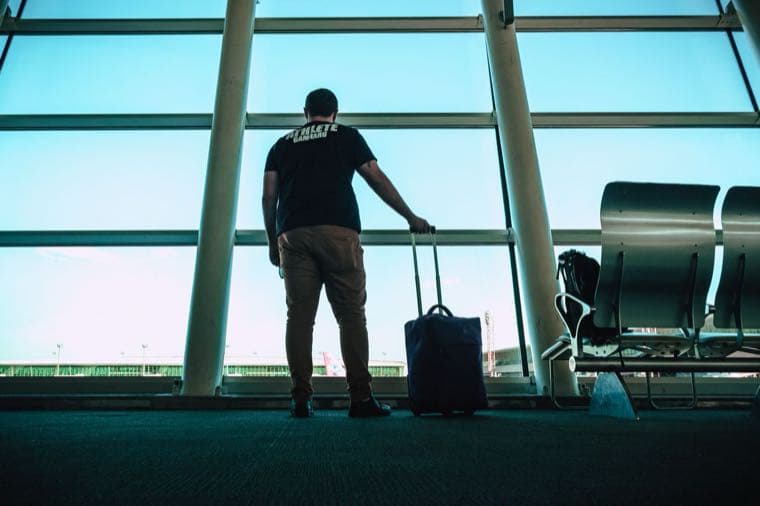 A traveller with luggage at an airport, the classic use of long service leave
