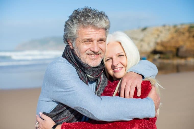 An older couple relaxing together outdoors