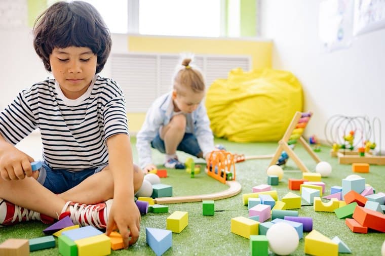 Children playing with blocks at a childcare centre
