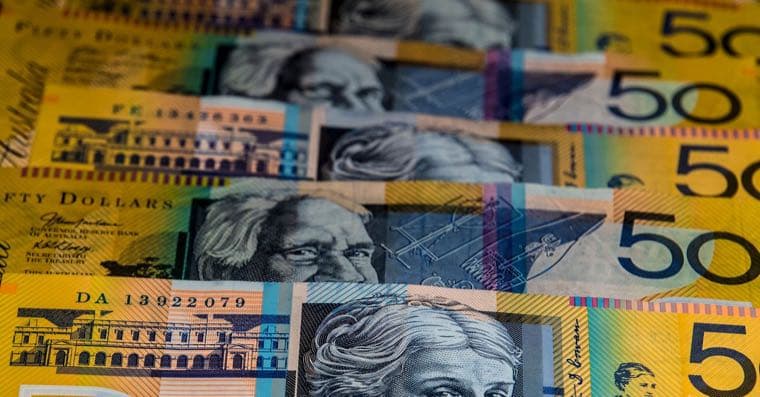 A stack of Australian bank notes representing steady bond income