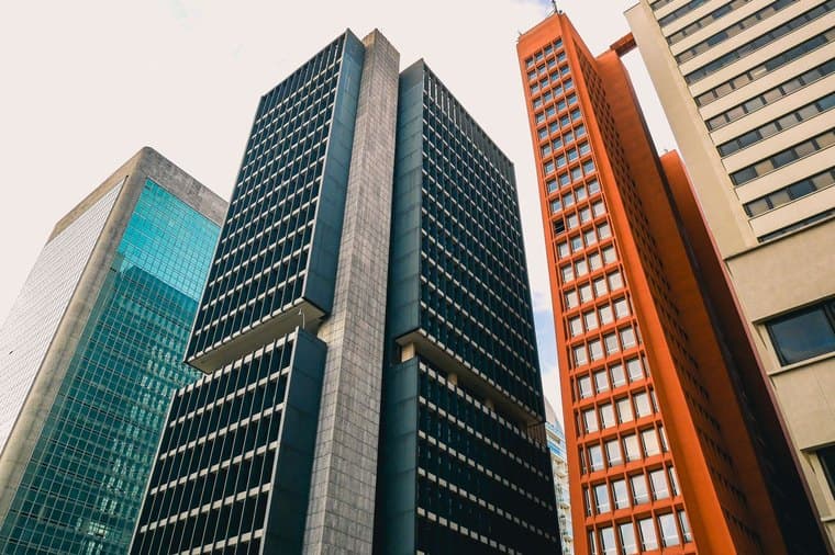 Modern commercial office towers, representing listed Australian property trusts (A-REITs)