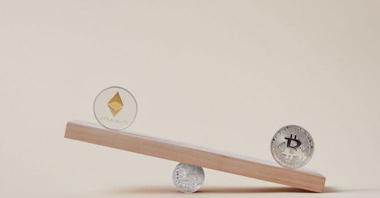 A balanced seesaw with shares on one side and bonds on the other