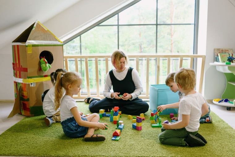 Young children playing at an approved childcare centre, representing the Child Care Subsidy