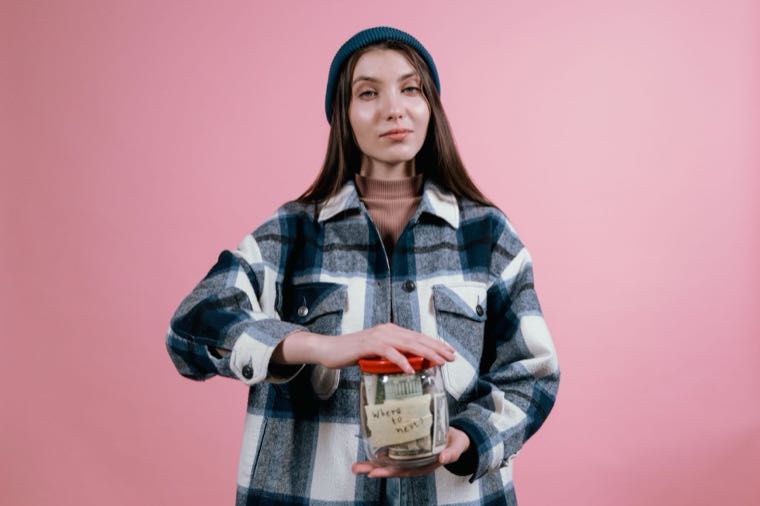 A graduate looking at their HECS balance, weighing up whether to pay it off early