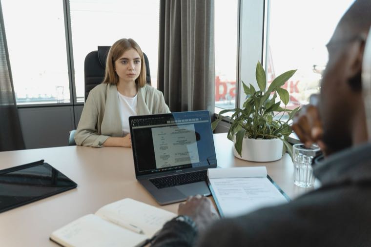 A job interview in a modern Australian office, the next step after redundancy